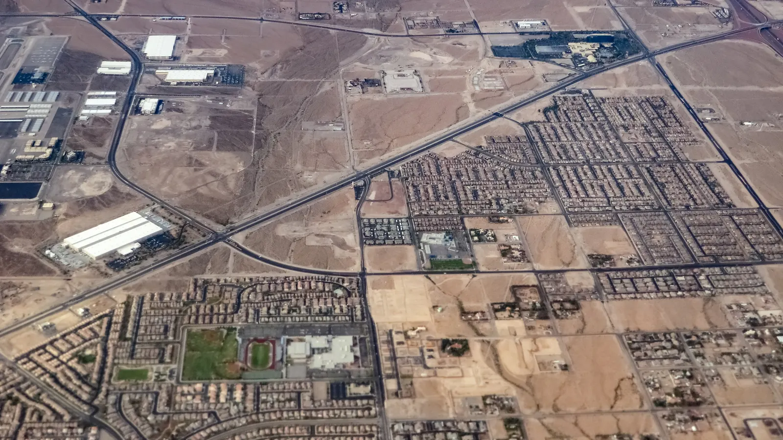 Aerial view of west Henderson, Nevada, with neighborhoods, roads and commercial buildings